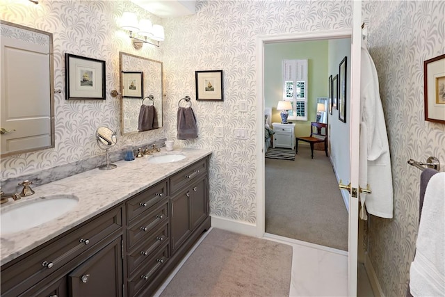 8367 Baytree Dr Unit 8367, Vero Beach, FL 32963 - full bathroom with wallpapered walls and double vanity
