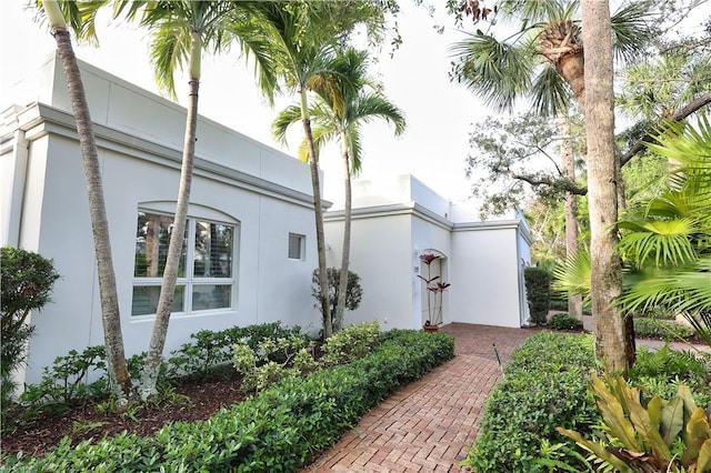 view of home's exterior with stucco siding