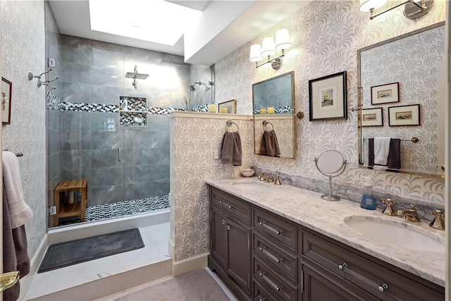 8367 Baytree Dr Unit 8367, Vero Beach, FL 32963 - bathroom featuring a walk in shower, double vanity, and wallpapered walls