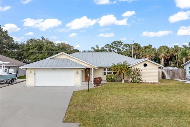 ranch-style house with a front lawn and a garage