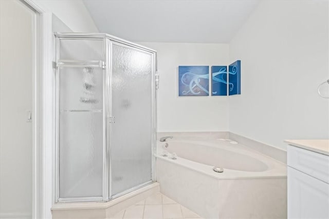 bathroom with vanity, tile patterned flooring, and independent shower and bath