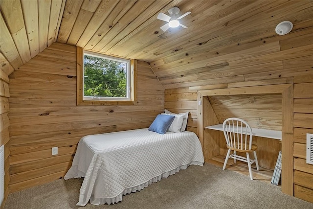 carpeted bedroom featuring wood walls, wood ceiling, and lofted ceiling