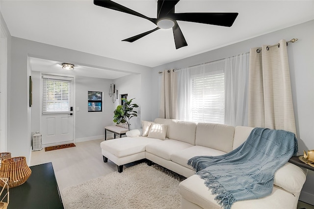 living room with ceiling fan