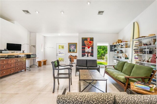 649 E Causeway Blvd, Vero Beach, FL 32963 - living room with an office area, light tile patterned floors, and recessed lighting