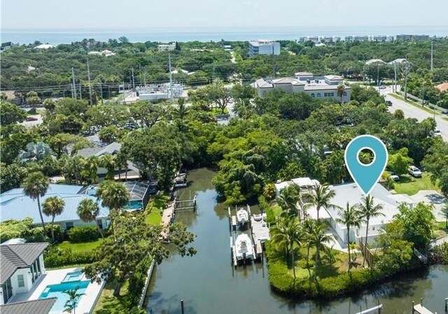 649 E Causeway Blvd, Vero Beach, FL 32963 - bird's eye view of a nearby body of water and a tree filled landscape
