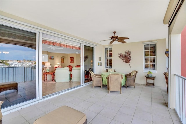 view of patio featuring ceiling fan