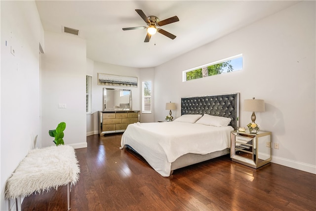 bedroom featuring ceiling fan and dark hardwood / wood-style flooring