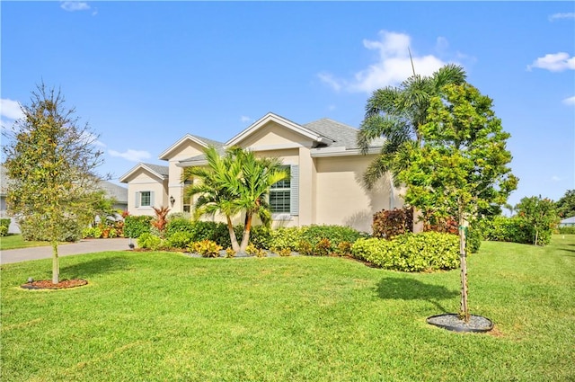 view of front of house with a front lawn