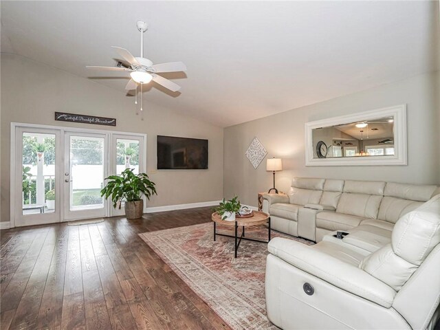 living room featuring ceiling fan, dark hardwood / wood-style flooring, and lofted ceiling