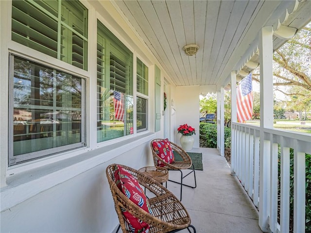 balcony featuring a porch