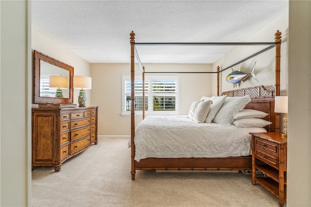 carpeted bedroom with a textured ceiling