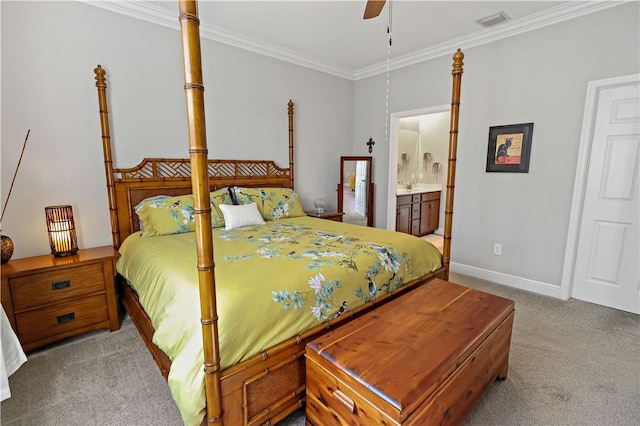 bedroom with carpet, baseboards, visible vents, ensuite bath, and ornamental molding