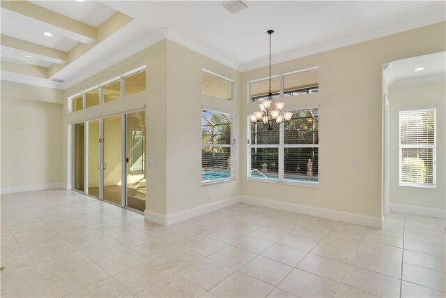 400 Sapphire Way SW, Vero Beach, FL 32968 - empty room with a chandelier, light tile patterned floors, recessed lighting, and a high ceiling