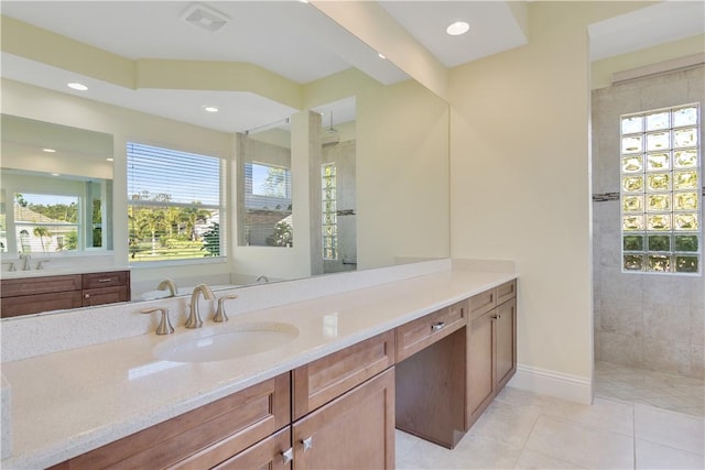 400 Sapphire Way SW, Vero Beach, FL 32968 - bathroom with vanity, a walk in shower, tile patterned flooring, and recessed lighting