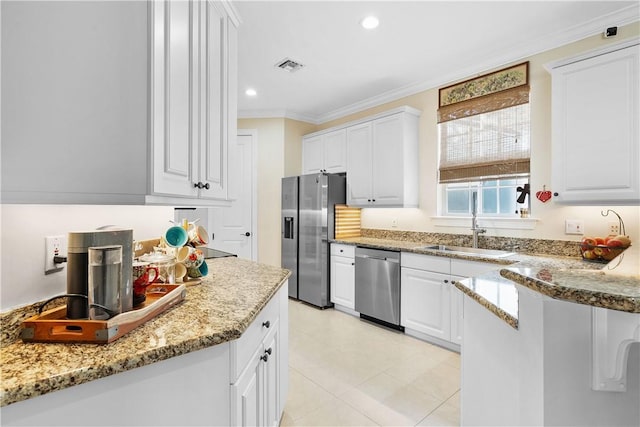 1155 Governors Way, Vero Beach, FL 32963 - kitchen with stainless steel appliances, a sink, ornamental molding, light stone counters, and recessed lighting