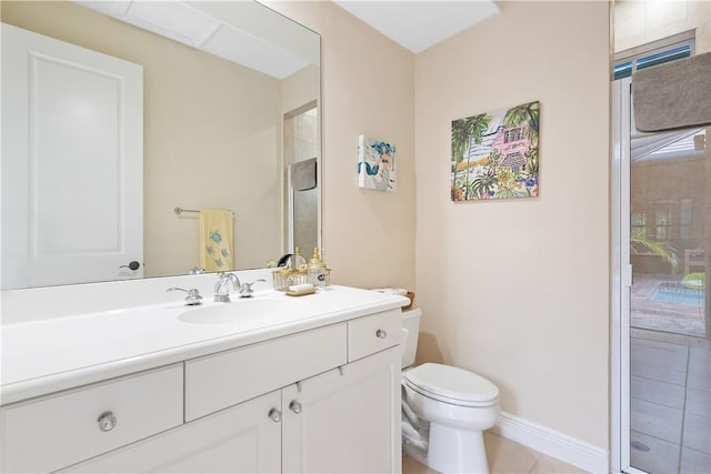 1155 Governors Way, Vero Beach, FL 32963 - bathroom with toilet, vanity, a shower with shower door, baseboards, and tile patterned flooring