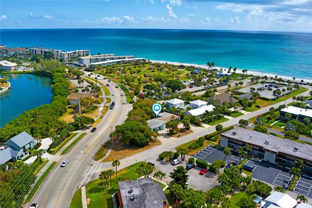 bird's eye view with a water view