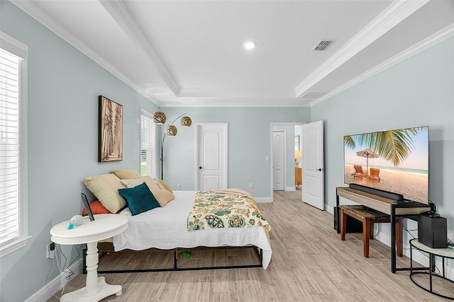 8645 95th Ave, Vero Beach, FL 32967 - bedroom with a tray ceiling, light wood-type flooring, crown molding, baseboards, and recessed lighting