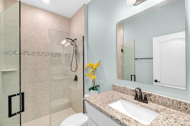 8645 95th Ave, Vero Beach, FL 32967 - full bath featuring a stall shower, toilet, and vanity