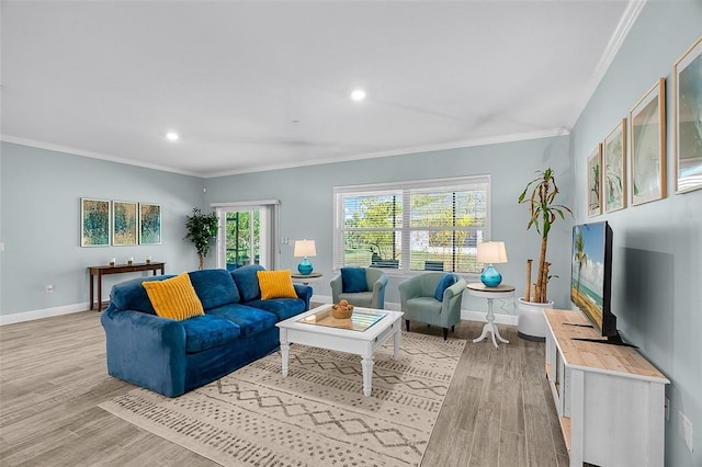 8645 95th Ave, Vero Beach, FL 32967 - living area featuring crown molding, baseboards, light wood-style floors, and recessed lighting