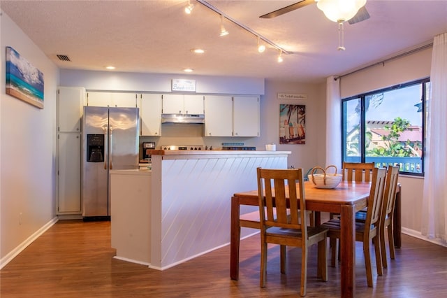 kitchen featuring dark hardwood / wood-style floors, white cabinetry, rail lighting, ceiling fan, and stainless steel fridge with ice dispenser