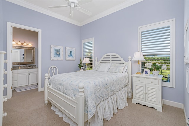 bedroom featuring ceiling fan, light carpet, connected bathroom, and multiple windows