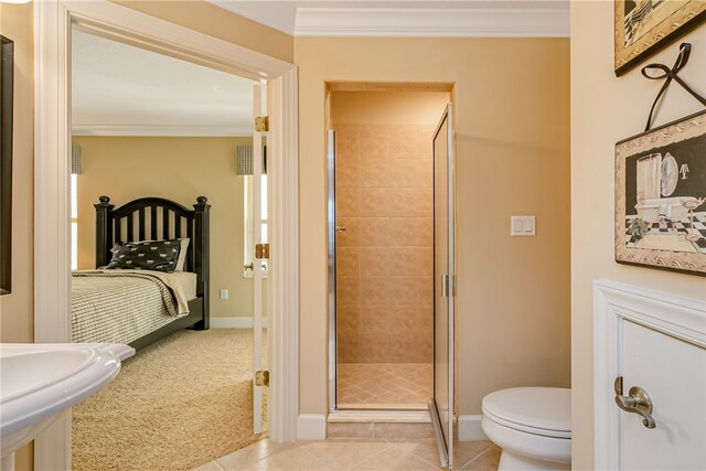 bathroom with walk in shower, tile patterned flooring, and ornamental molding