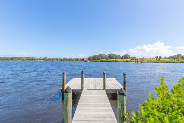 view of dock featuring a water view