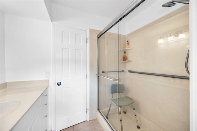 505 19th St, Vero Beach, FL 32960 - full bath featuring a stall shower, tile patterned floors, and vanity