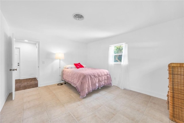 505 19th St, Vero Beach, FL 32960 - bedroom featuring light tile patterned flooring, baseboards, and visible vents