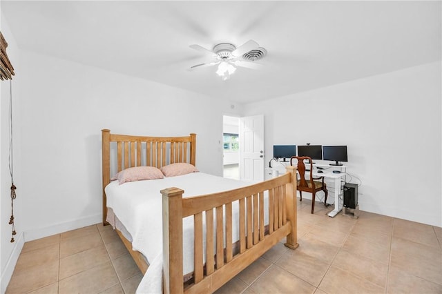505 19th St, Vero Beach, FL 32960 - bedroom with a ceiling fan, light tile patterned flooring, and baseboards