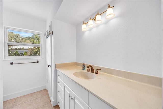 505 19th St, Vero Beach, FL 32960 - bathroom featuring baseboards, tile patterned floors, and vanity