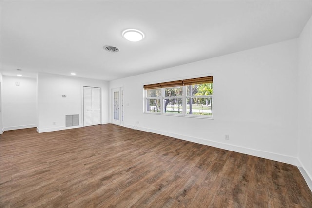 505 19th St, Vero Beach, FL 32960 - empty room with baseboards, visible vents, and wood finished floors
