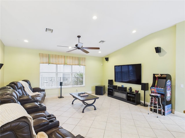 living area with lofted ceiling, light tile patterned flooring, recessed lighting, and visible vents