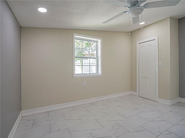 339 6th Ave SW, Vero Beach, FL 32962 - unfurnished room with light marble finish floors, recessed lighting, and a ceiling fan