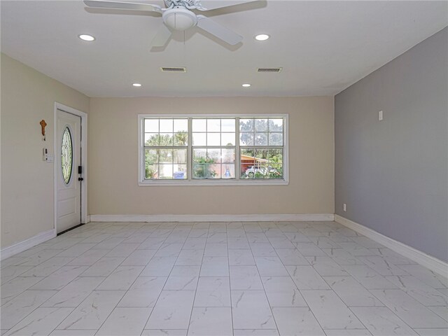 empty room with ceiling fan