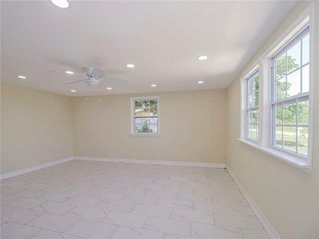 339 6th Ave SW, Vero Beach, FL 32962 - unfurnished room featuring healthy amount of natural light, light marble finish flooring, recessed lighting, and a ceiling fan