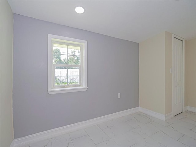 339 6th Ave SW, Vero Beach, FL 32962 - empty room with light marble finish flooring and recessed lighting