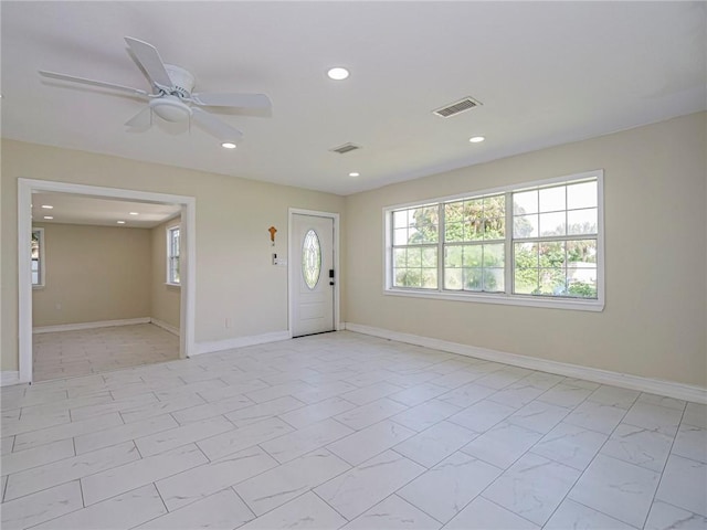 339 6th Ave SW, Vero Beach, FL 32962 - entrance foyer with recessed lighting, ceiling fan, and light marble finish floors