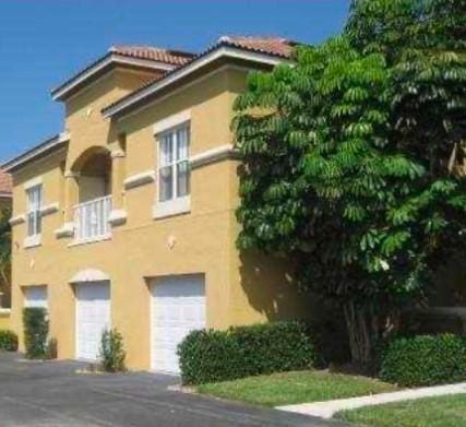 view of property with a garage