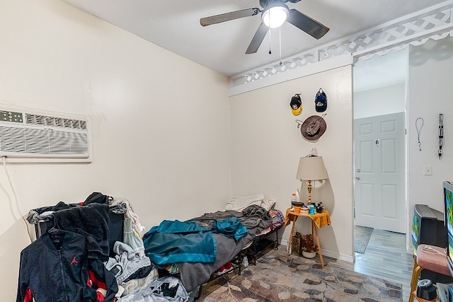 bedroom featuring hardwood / wood-style floors and ceiling fan