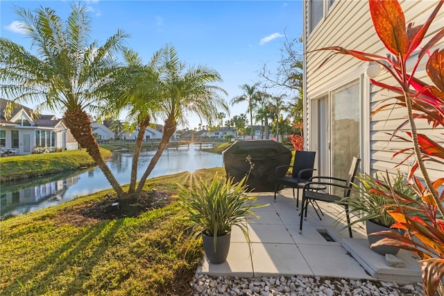 view of patio / terrace with a water view