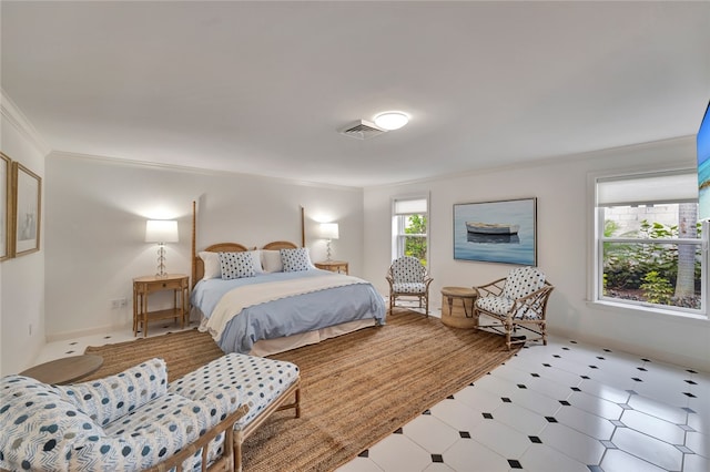 bedroom with crown molding