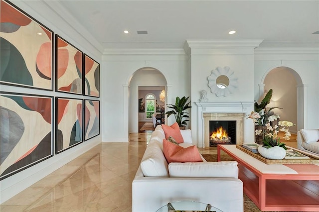 600 Ocean Rd, Vero Beach, FL 32963 - living room with arched walkways, a premium fireplace, ornamental molding, recessed lighting, and marble finish flooring
