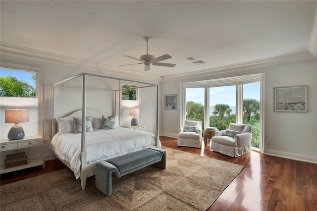 bedroom with ornamental molding, ceiling fan, and dark hardwood / wood-style floors