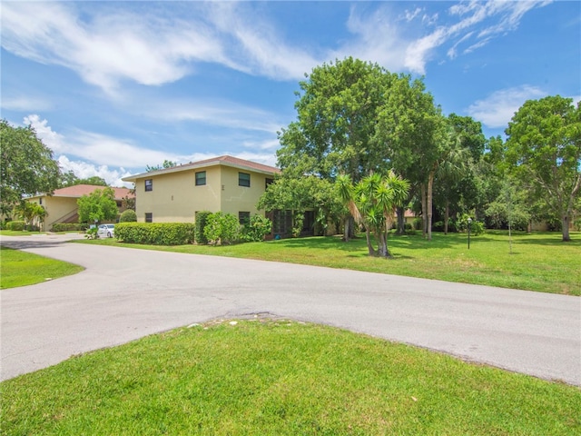 exterior space featuring a front yard