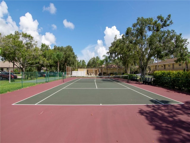 view of sport court with basketball hoop