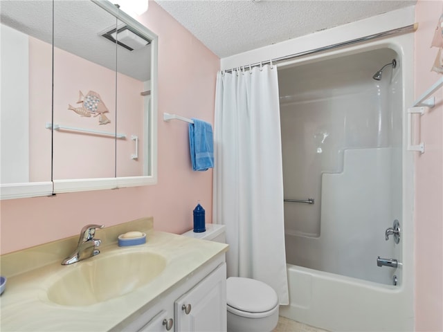 full bathroom with vanity, a textured ceiling, tile patterned flooring, toilet, and shower / bathtub combination with curtain