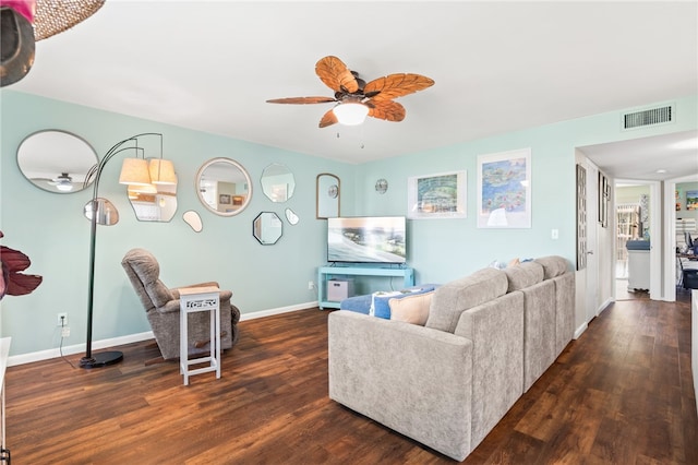 51 Woodland Dr Unit 106, Vero Beach, FL 32962 - living area featuring a ceiling fan and dark wood-style flooring