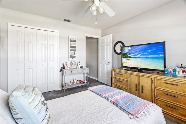 carpeted bedroom with ceiling fan, visible vents, and a closet